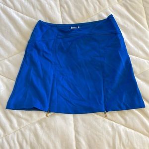 Blue mini skirt with two zip ups near the thigh